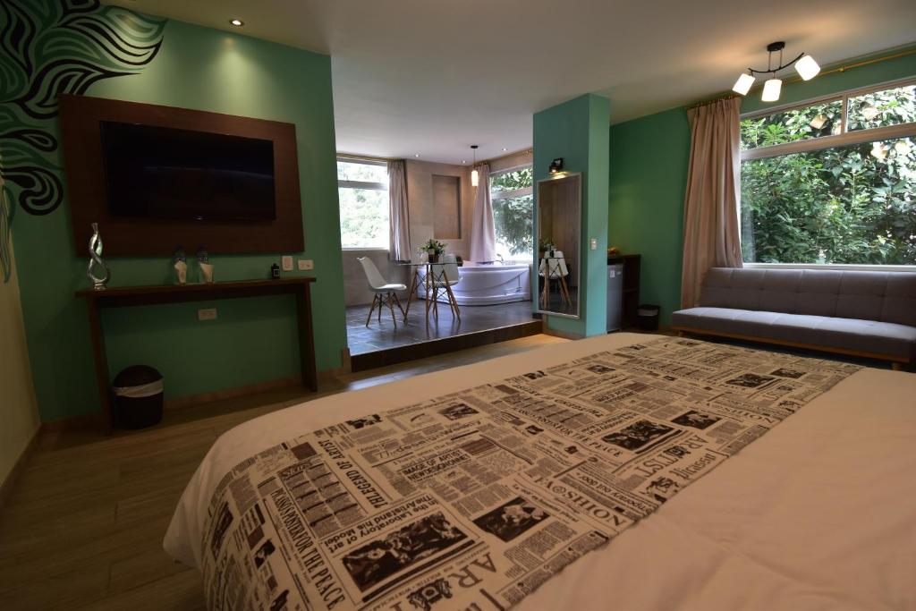 Postel nebo postele na pokoji v ubytování Monte Selva Hotel Spa Termal