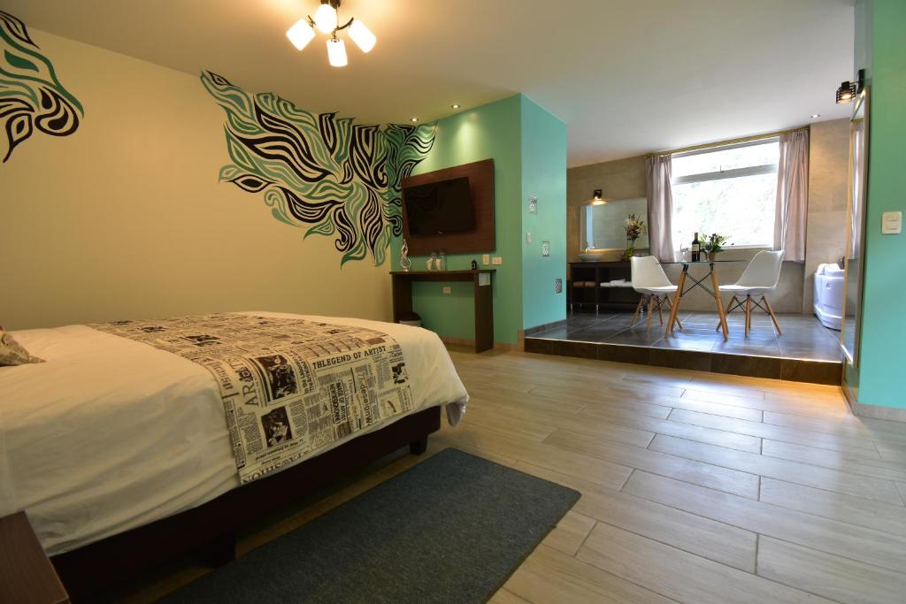 Postel nebo postele na pokoji v ubytování Monte Selva Hotel Spa Termal