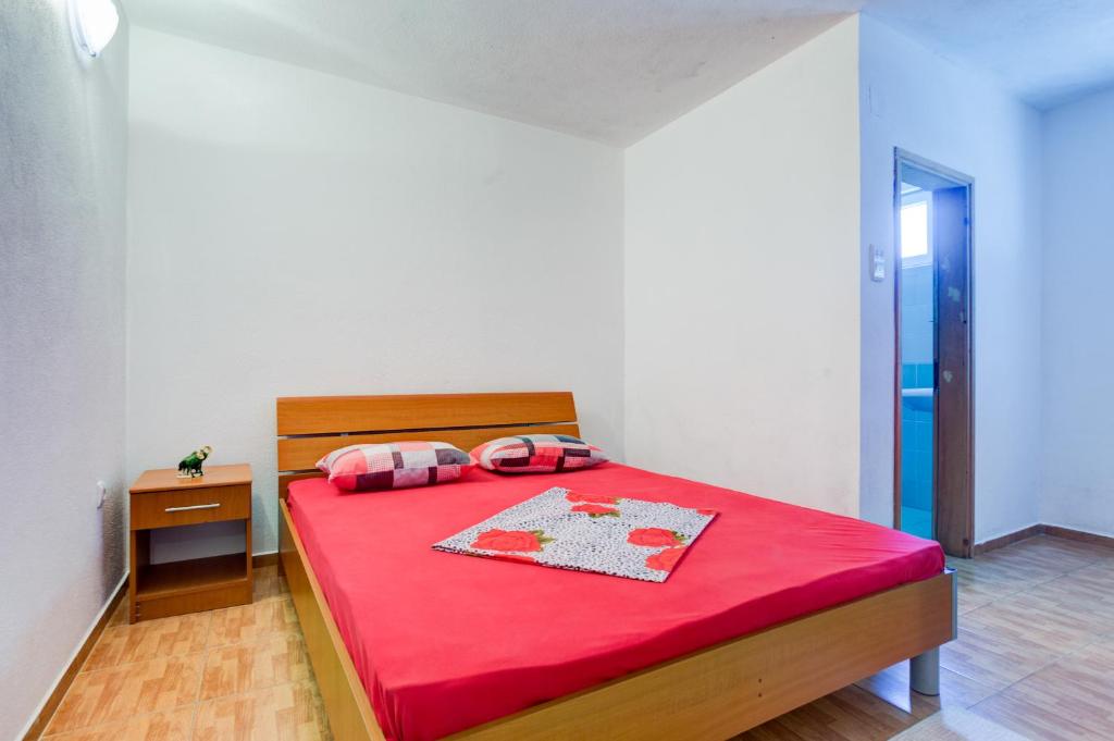 Postel nebo postele na pokoji v ubytování Apartments Radost
