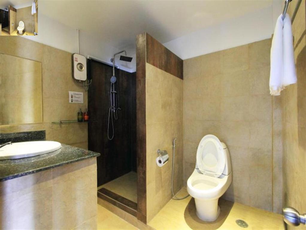 Ein Badezimmer in der Unterkunft Samui Beach Residence Hotel