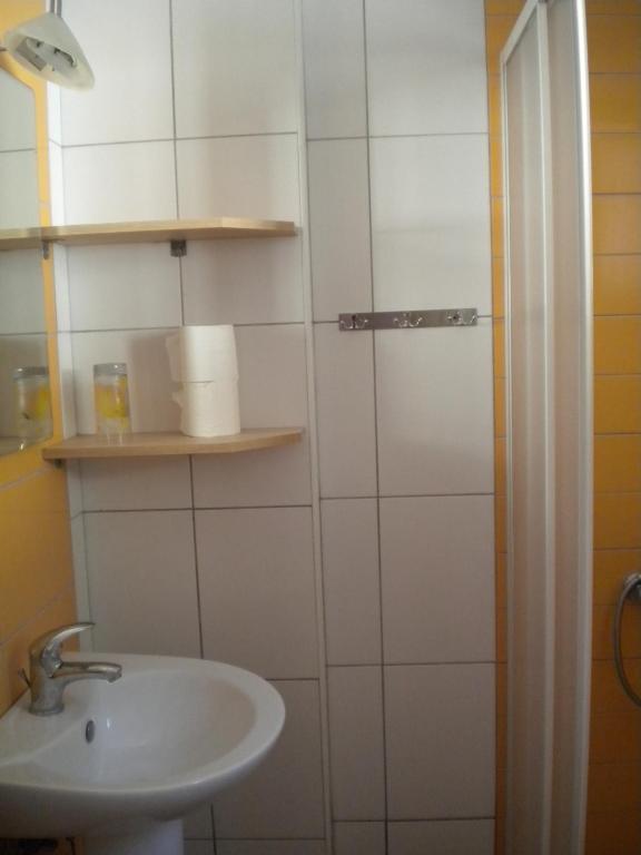 Koupelna v ubytování Elina Apartments