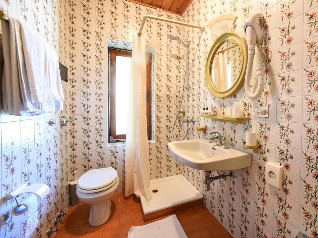 Koupelna v ubytování Hotel Adriana