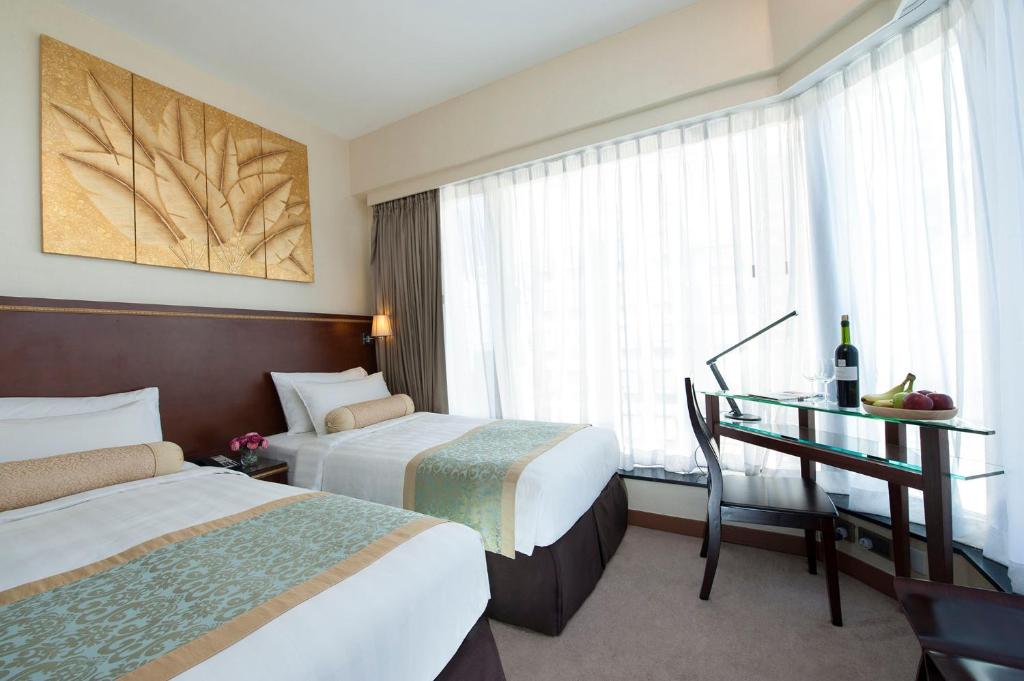 Postel nebo postele na pokoji v ubytování Brighton Hotel Hong Kong
