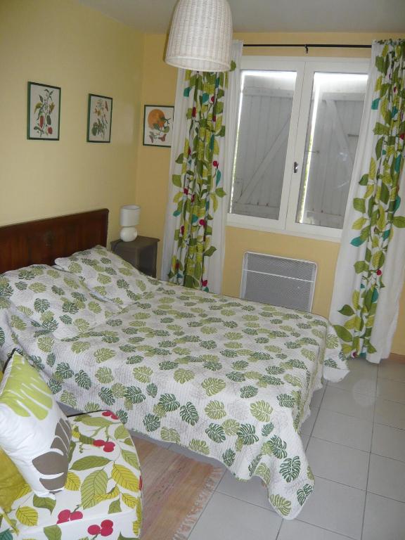 Postel nebo postele na pokoji v ubytování Le Soubiran