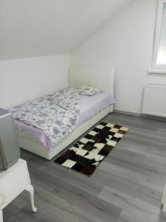 Ліжко або ліжка в номері Apartman All seasons