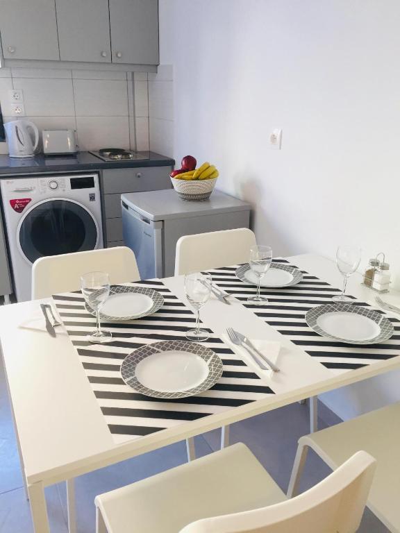 Kuchyň nebo kuchyňský kout v ubytování Finiki Seaside Apartment