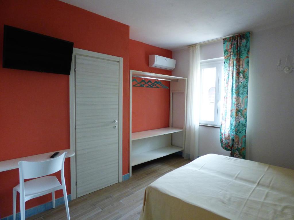Posteľ alebo postele v izbe v ubytovaní Aramoni B&B
