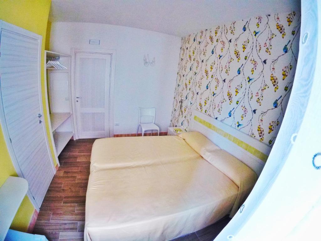 Posteľ alebo postele v izbe v ubytovaní Aramoni B&B