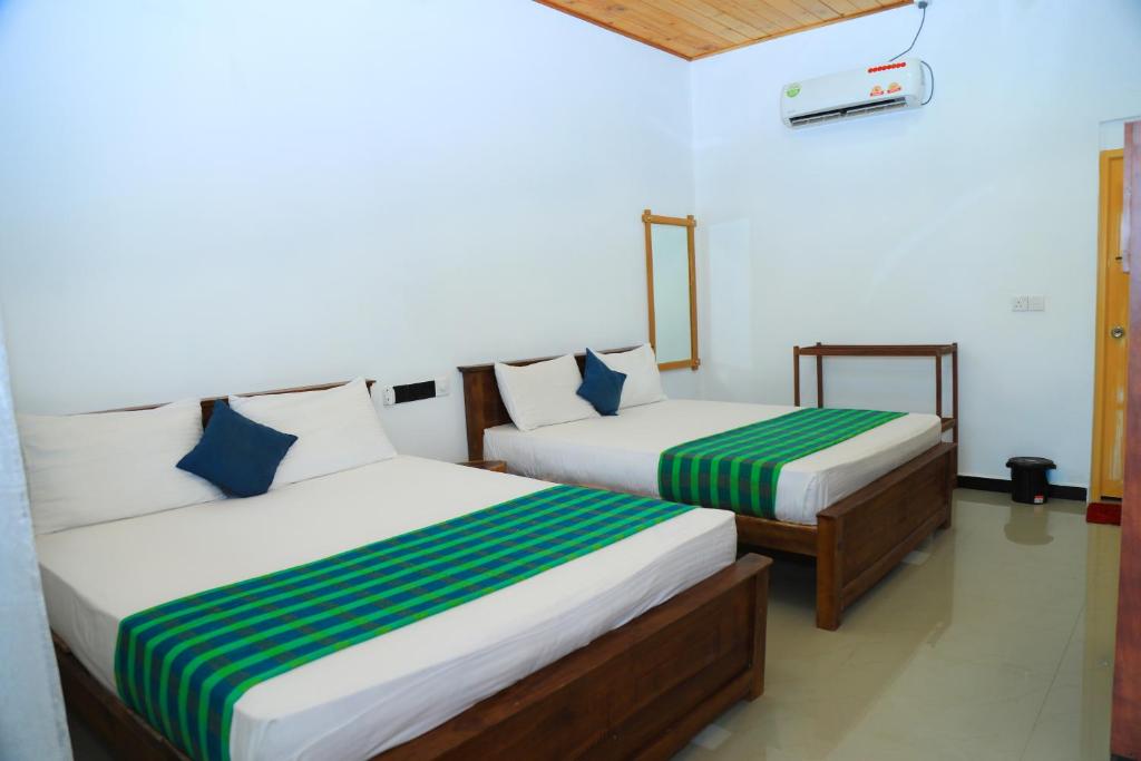 Shan Guest and Restaurant Nilaveli - Salle Quadruple