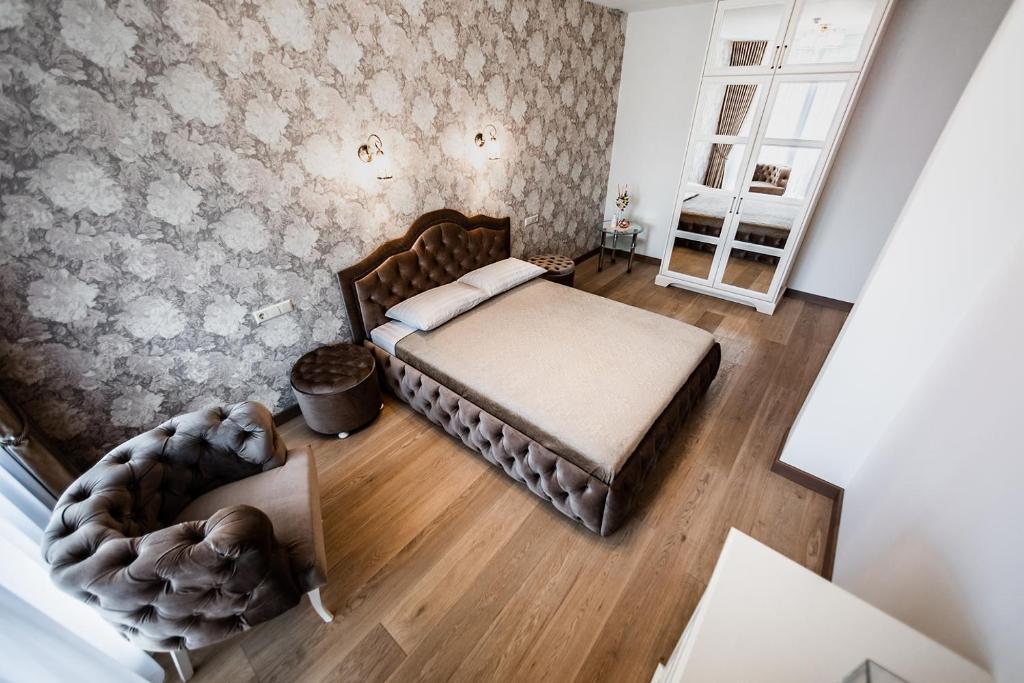 Postel nebo postele na pokoji v ubytování FoRest Apartments