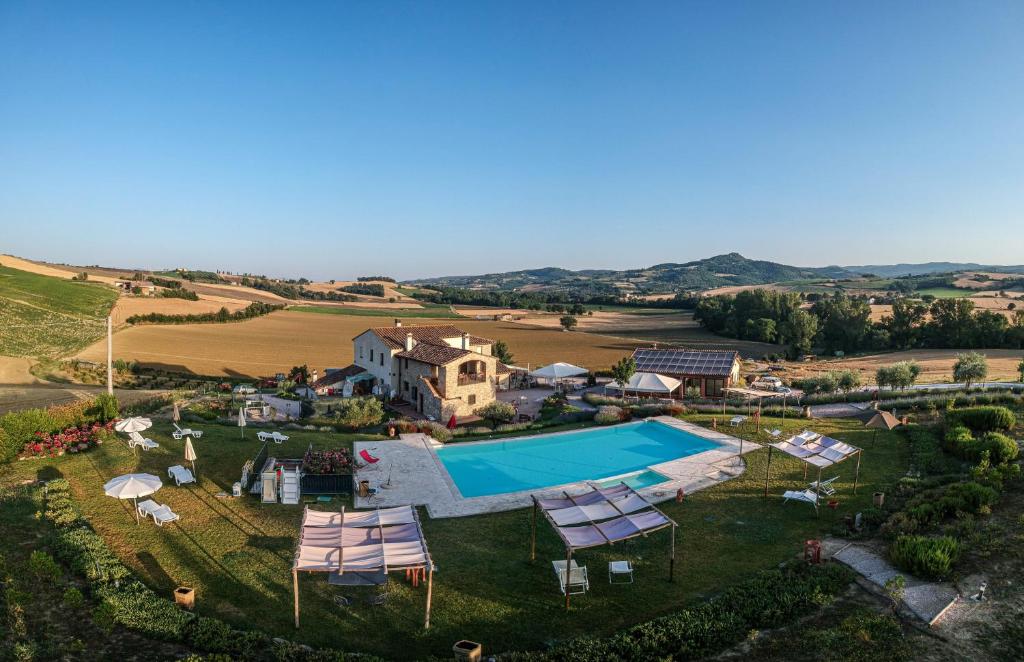 an aerial view of an estate with a swimming pool at Agriturismo San Silvestro in Marsciano