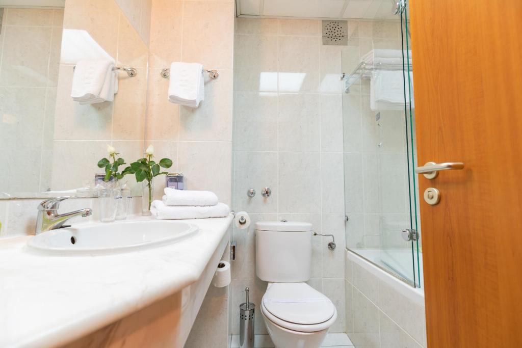 Koupelna v ubytování Hotel M