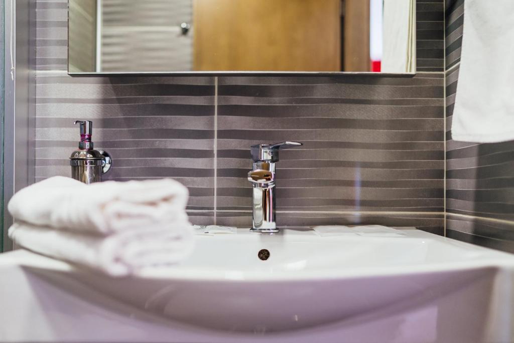 Koupelna v ubytování Hotel Walter