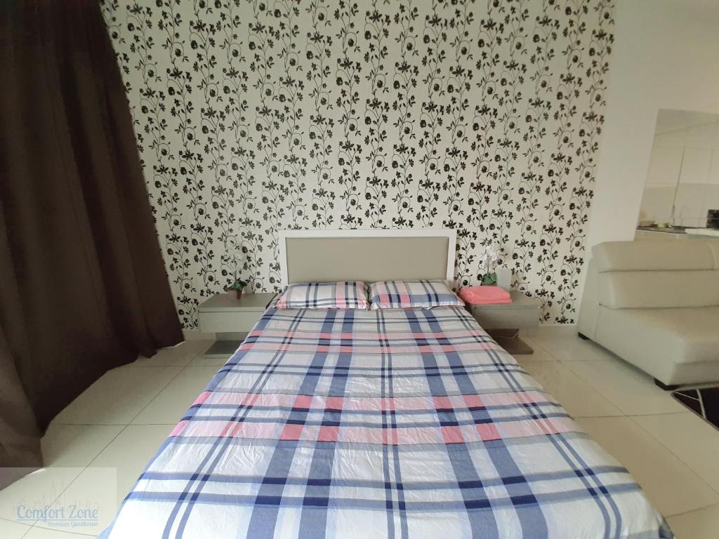 Postel nebo postele na pokoji v ubytování Comfort Zone Premium Guesthouse @ Evo Bangi