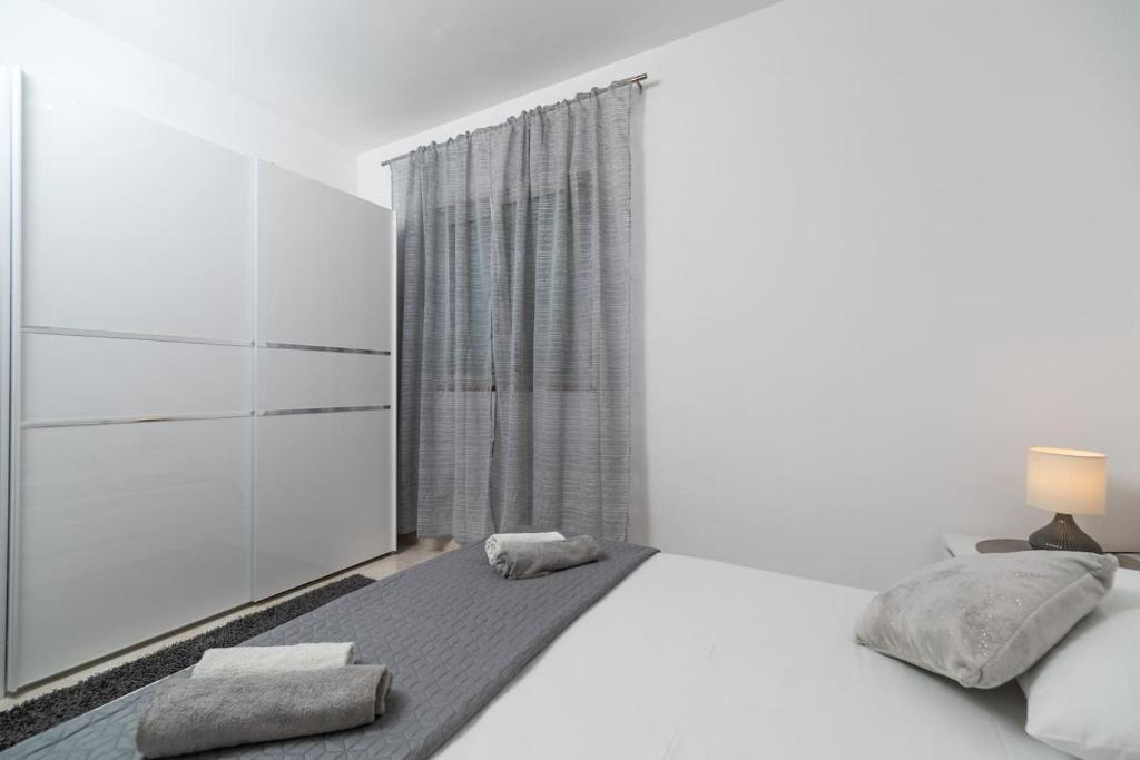 Postel nebo postele na pokoji v ubytování Villa Sea Lady