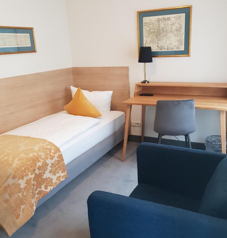 Postel nebo postele na pokoji v ubytování Altstadthotel Molitor