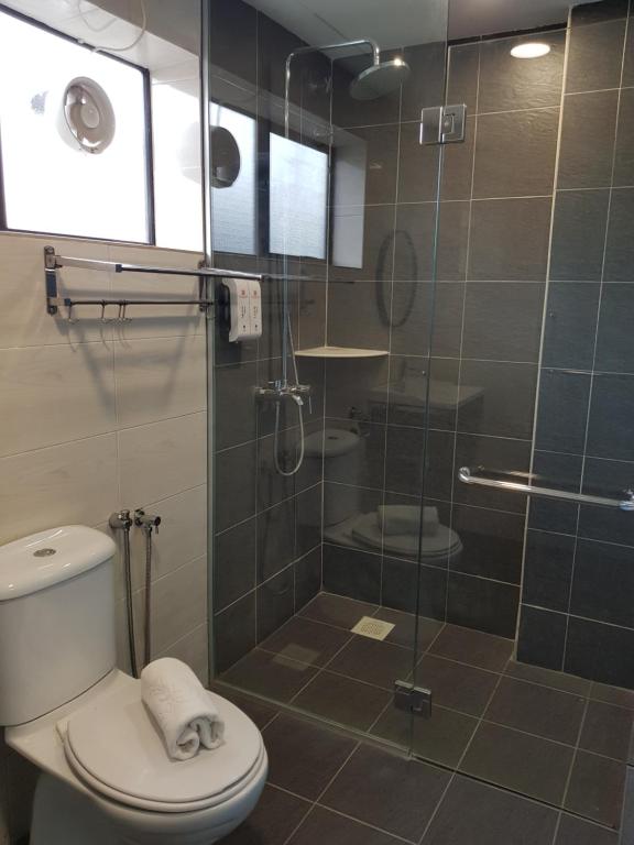 Koupelna v ubytování Bloommaze Boutique Hotel Klang