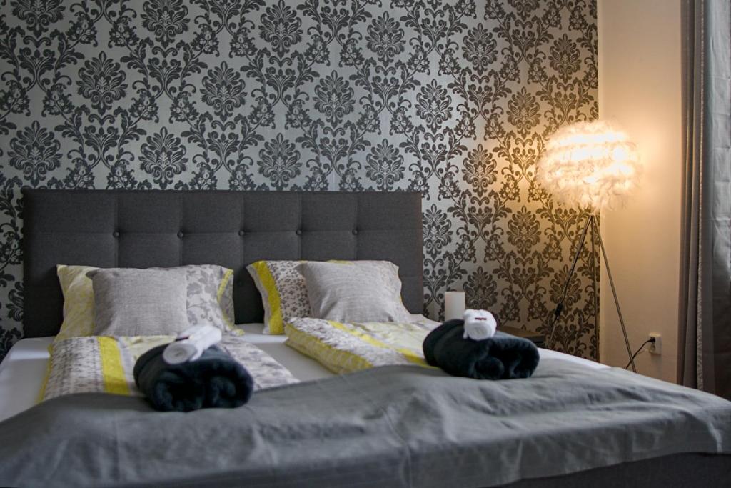 Posteľ alebo postele v izbe v ubytovaní Luxusní Apartmán NMNM Family