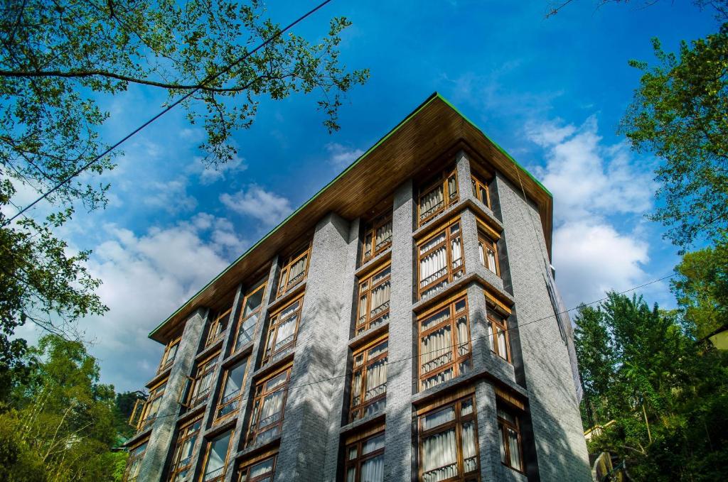 a building with windows on the side of it at The Golden Crest in Gangtok