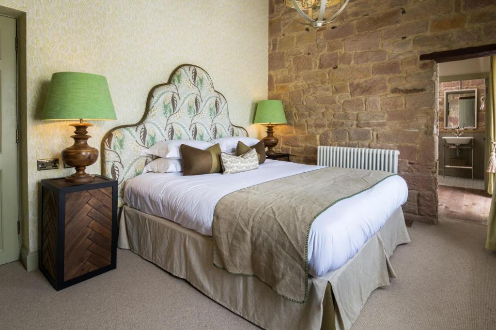 Кровать или кровати в номере Beadnell Towers Hotel