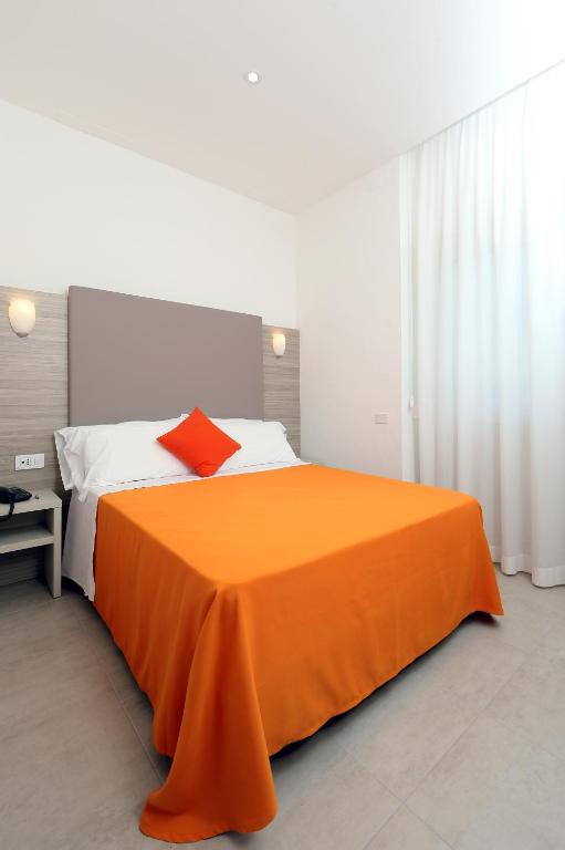 Postel nebo postele na pokoji v ubytování Hotel Simi Lan