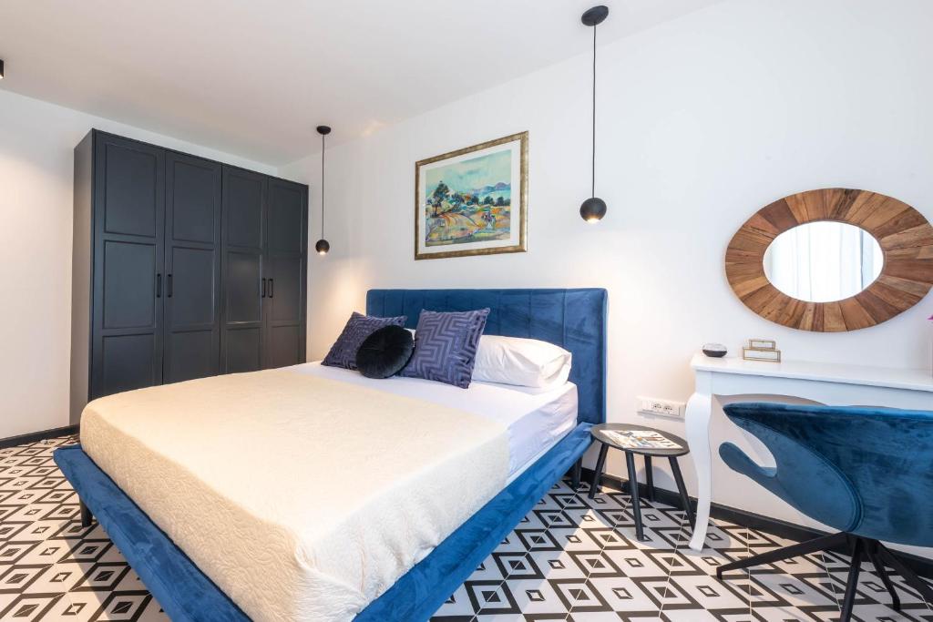 Posteľ alebo postele v izbe v ubytovaní Sun and stone apartment