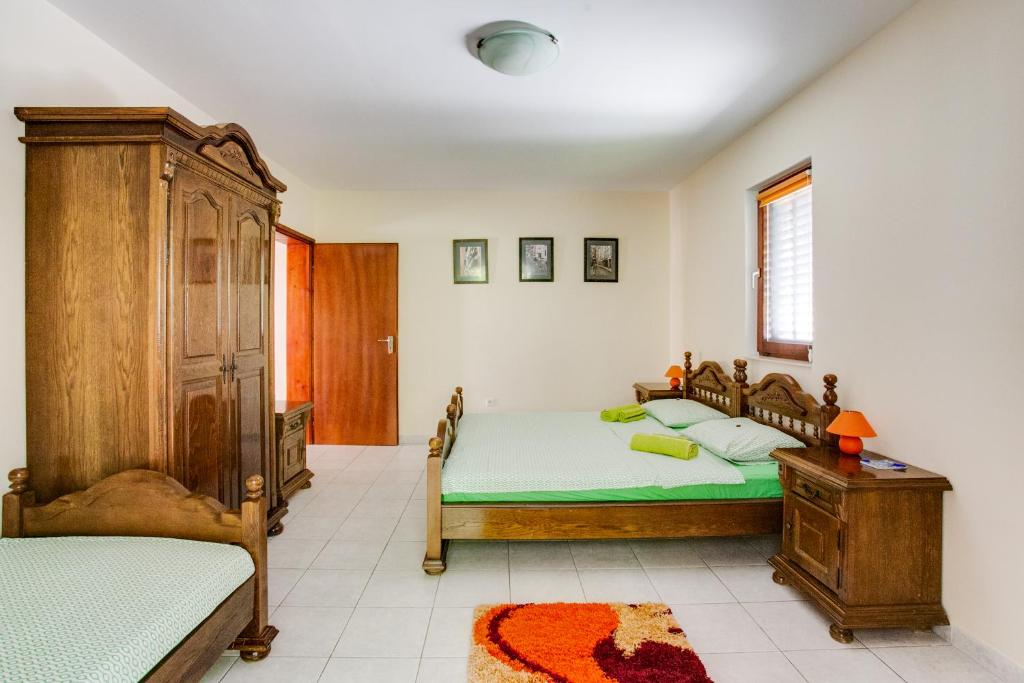 Postel nebo postele na pokoji v ubytování Villa Dionis