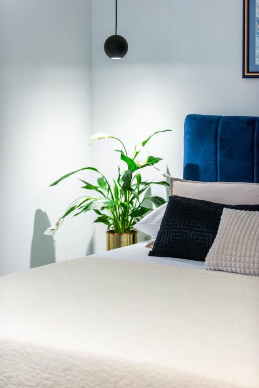 Posteľ alebo postele v izbe v ubytovaní Sun and stone apartment
