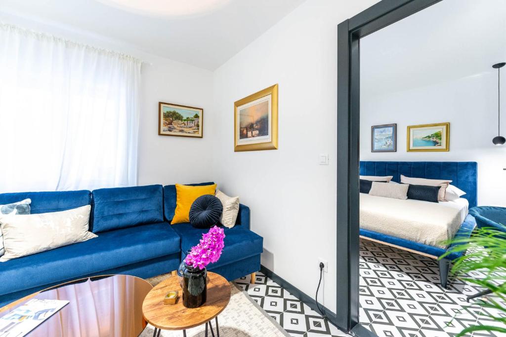 Posteľ alebo postele v izbe v ubytovaní Sun and stone apartment