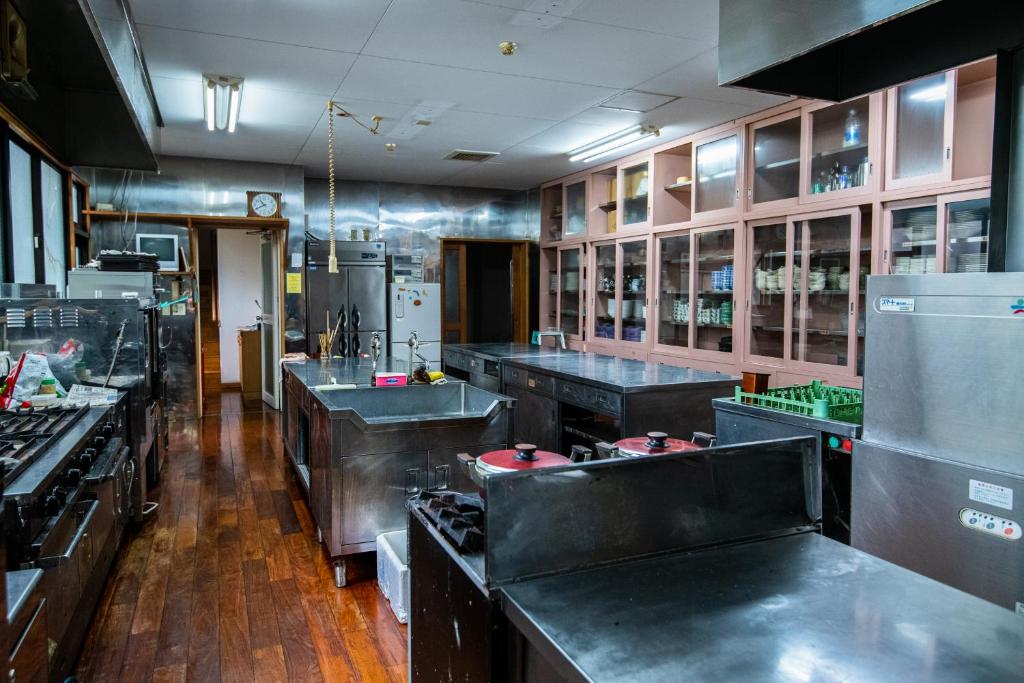 Kuchyň nebo kuchyňský kout v ubytování Toemu Nozawa Lodge