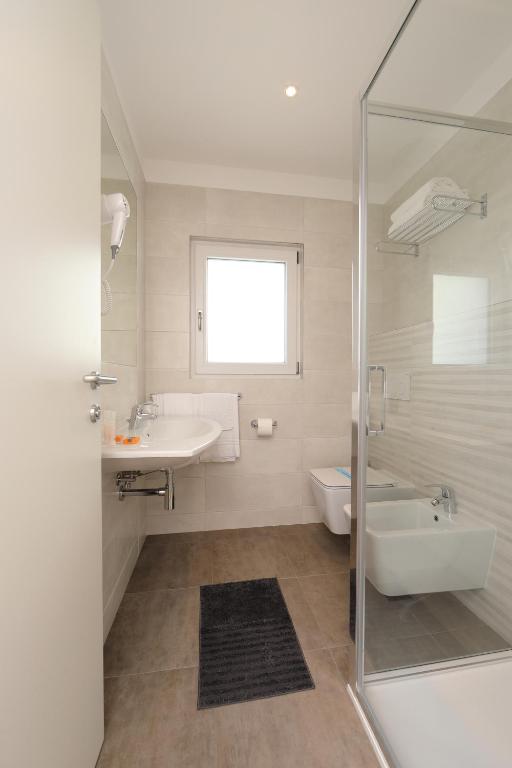 Koupelna v ubytování Hotel Simi Lan