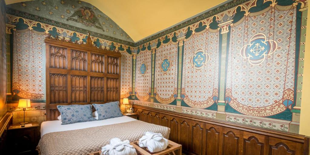 Postel nebo postele na pokoji v ubytování Hotel Jan Brito