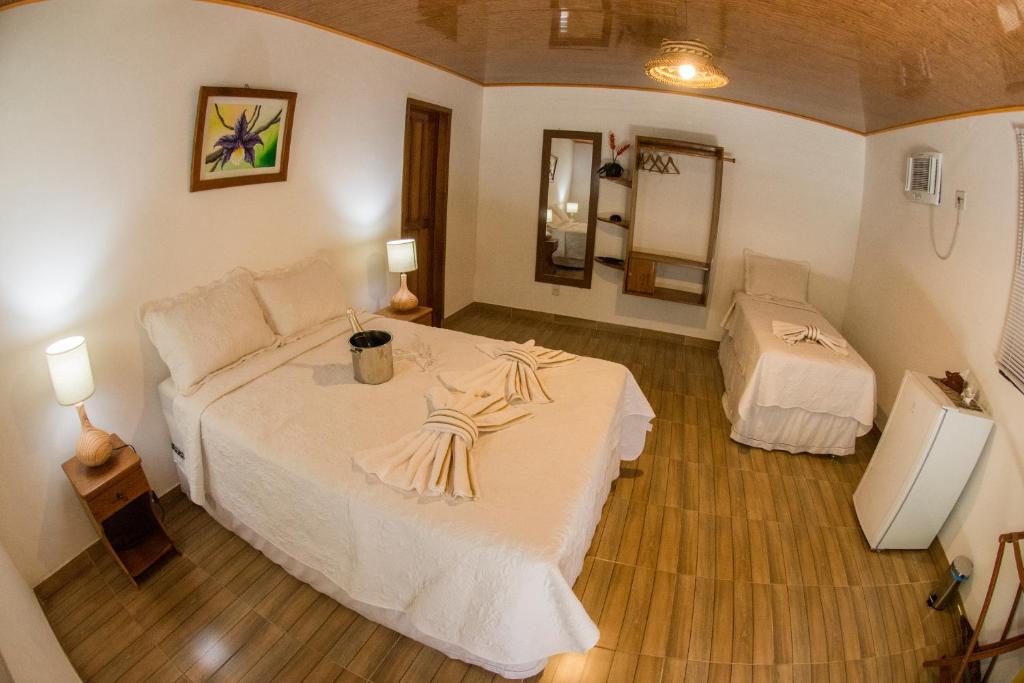 Voodi või voodid majutusasutuse Evolução Ecolodge toas