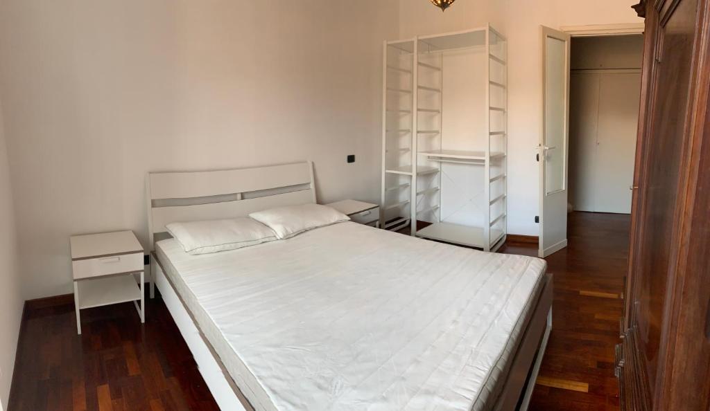 Posteľ alebo postele v izbe v ubytovaní Colosseo Boutique Apartment