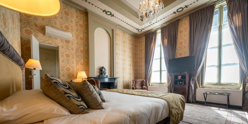 Postel nebo postele na pokoji v ubytování Hotel Jan Brito