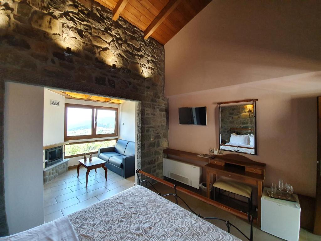 Postel nebo postele na pokoji v ubytování The View Village - Villas Suites & Spa