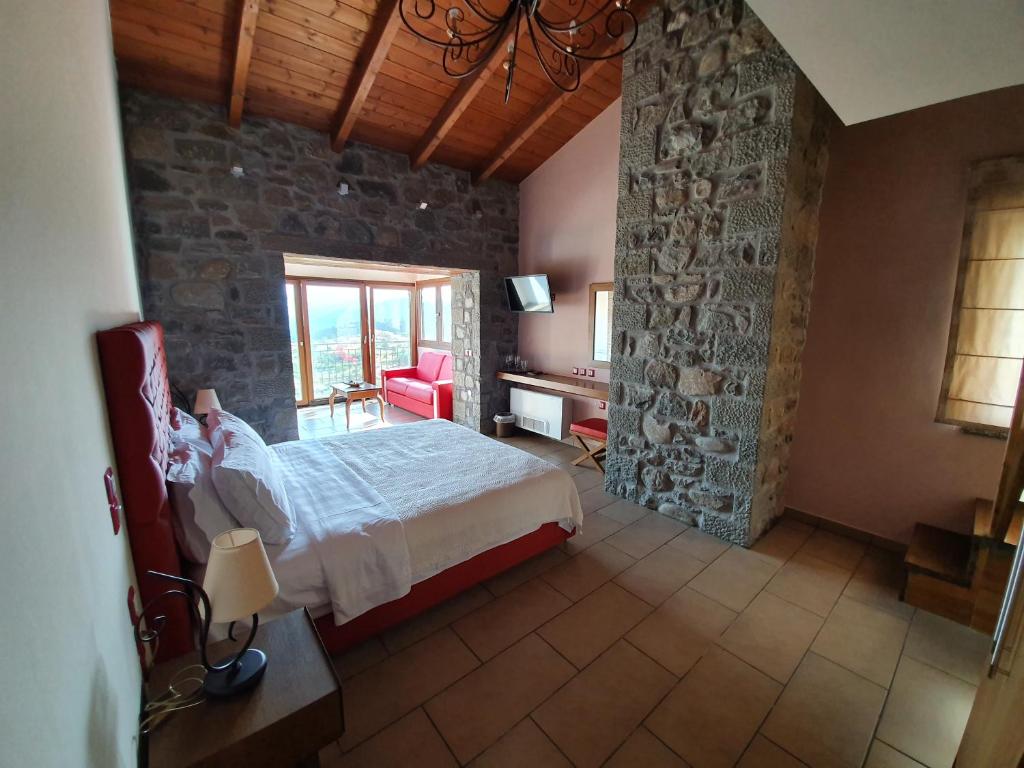 Postel nebo postele na pokoji v ubytování The View Village - Villas Suites & Spa