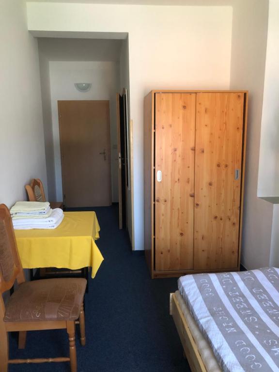 Postel nebo postele na pokoji v ubytování Zrcadlová Koza