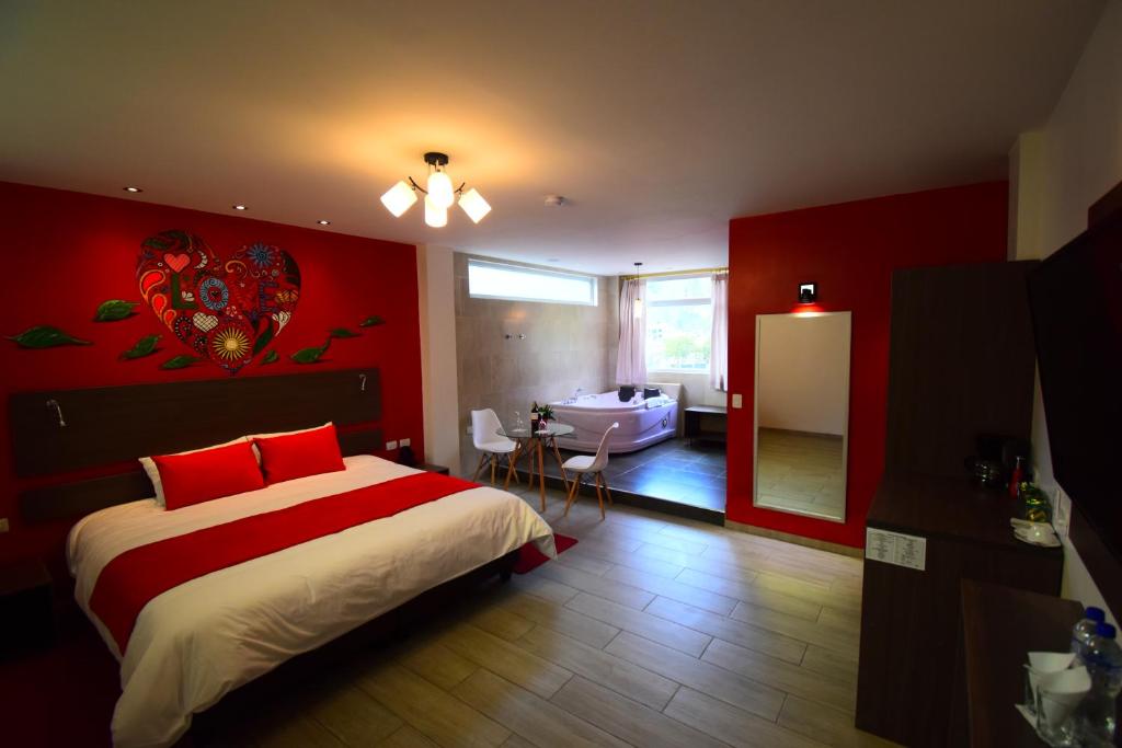 Postel nebo postele na pokoji v ubytování Monte Selva Hotel Spa Termal