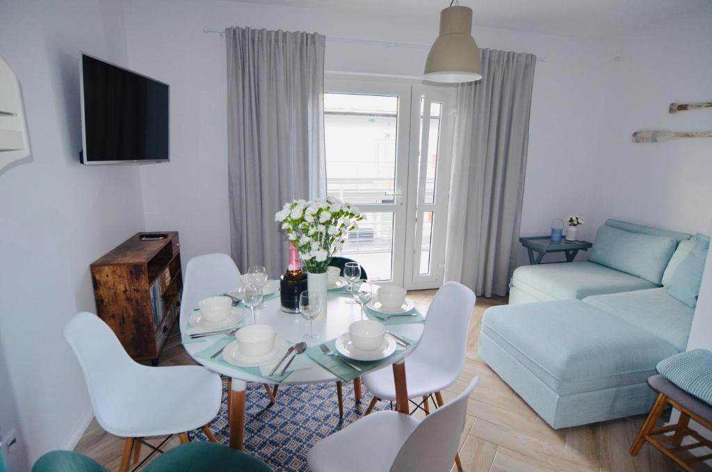 Posedenie v ubytovaní Apartamenty Piaskowe B21 z tarasem na dachu