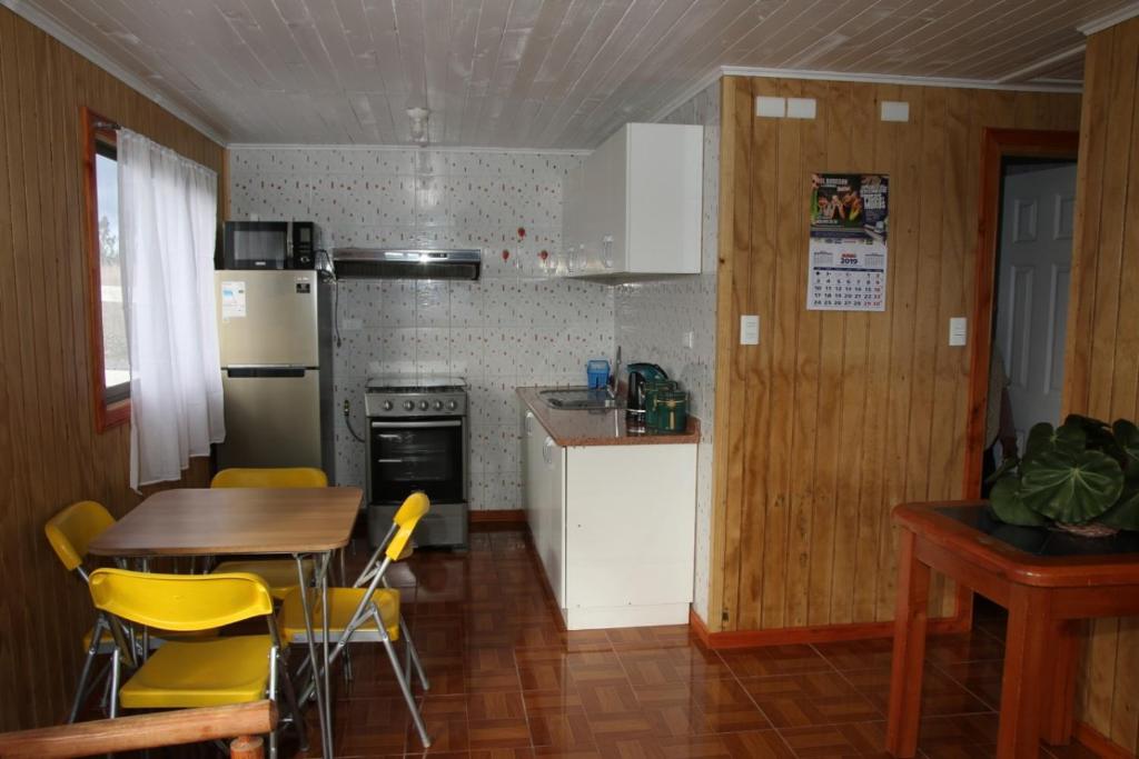 Kuchyň nebo kuchyňský kout v ubytování Laguna Verde Cabaña