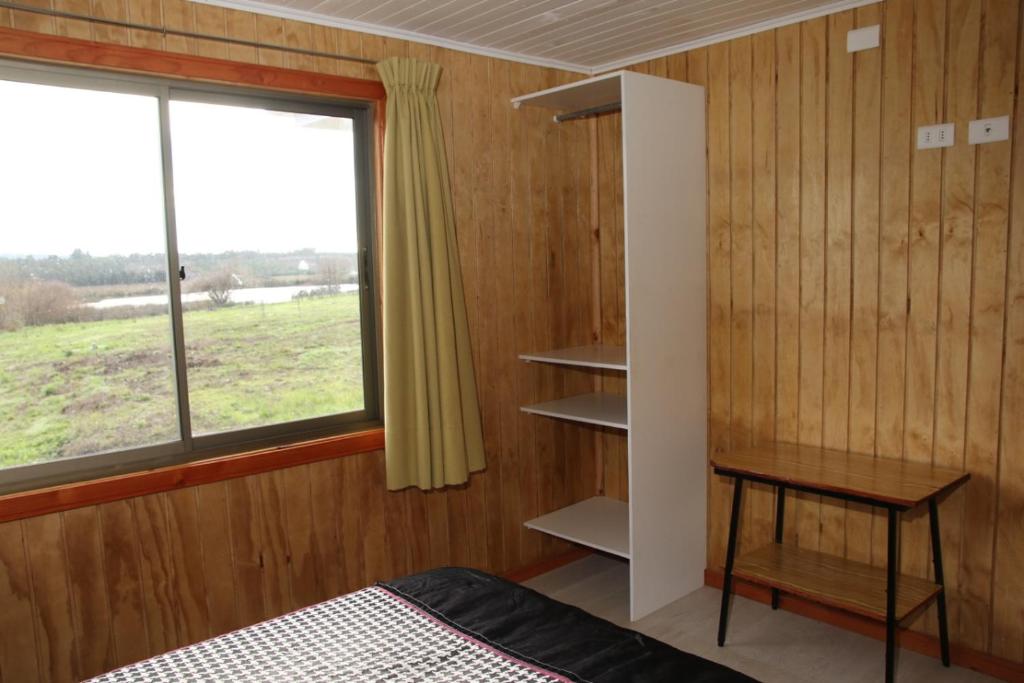 Postel nebo postele na pokoji v ubytování Laguna Verde Cabaña
