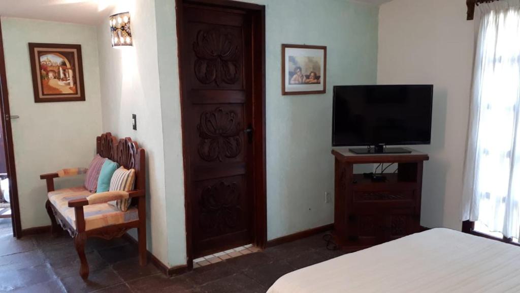 TV a/nebo společenská místnost v ubytování Hotel No Que No