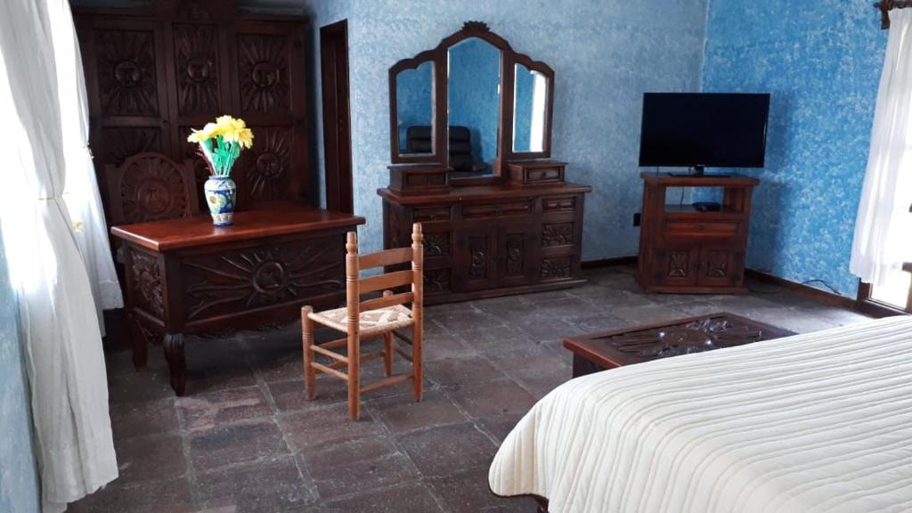 TV a/nebo společenská místnost v ubytování Hotel No Que No