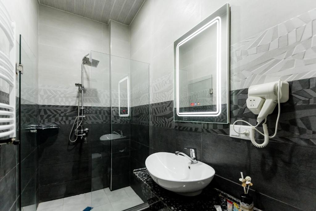 Koupelna v ubytování Hotel Makona