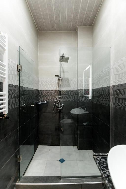 Koupelna v ubytování Hotel Makona
