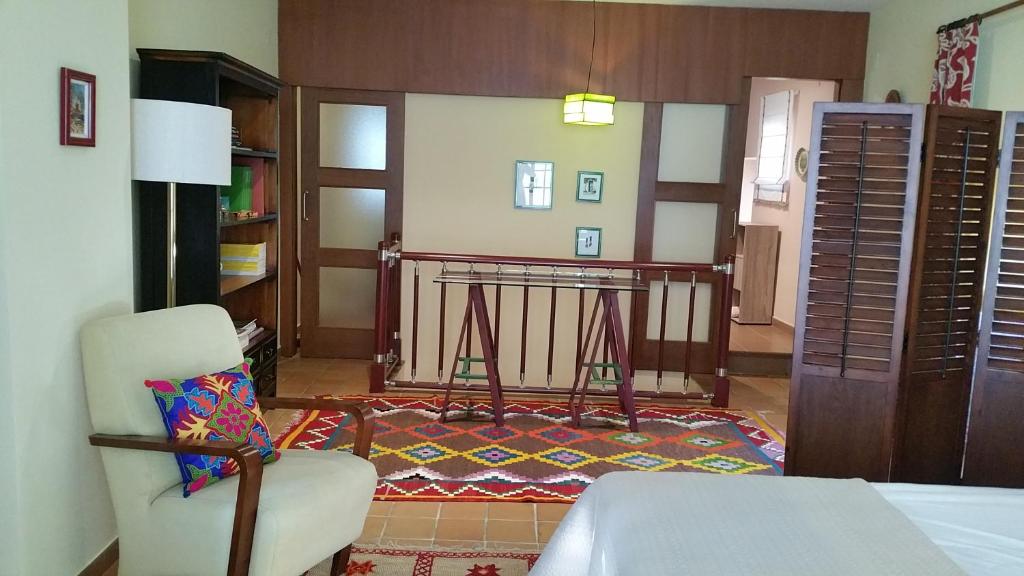 A bed or beds in a room at A CASA DO BUXO