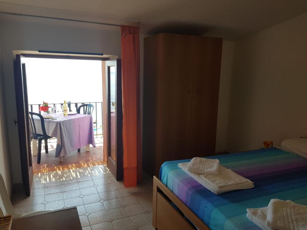 Łóżko lub łóżka w pokoju w obiekcie Hotel Residence Il Mulino