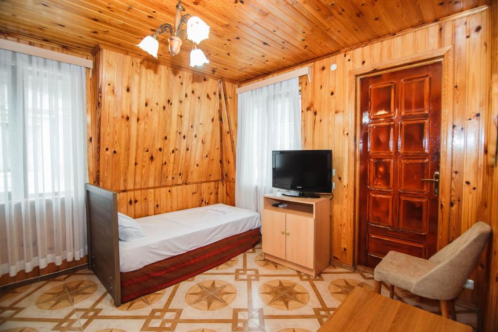 TV a/nebo společenská místnost v ubytování Guest House Nia