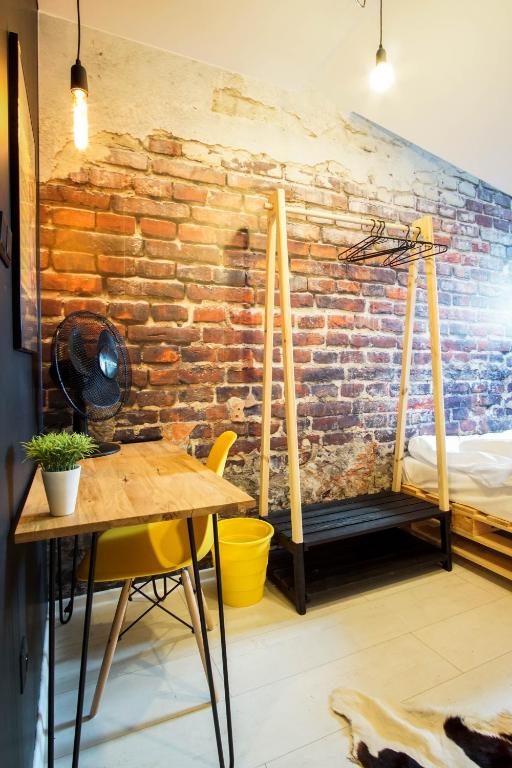 Postel nebo postele na pokoji v ubytování Retro Apartments